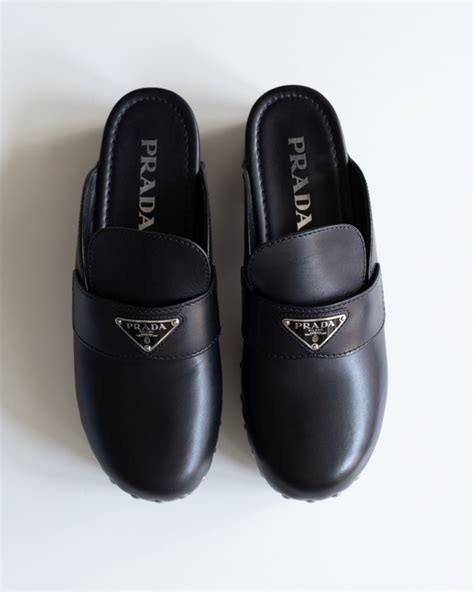 Shop Prada Studded Leather Clogs 